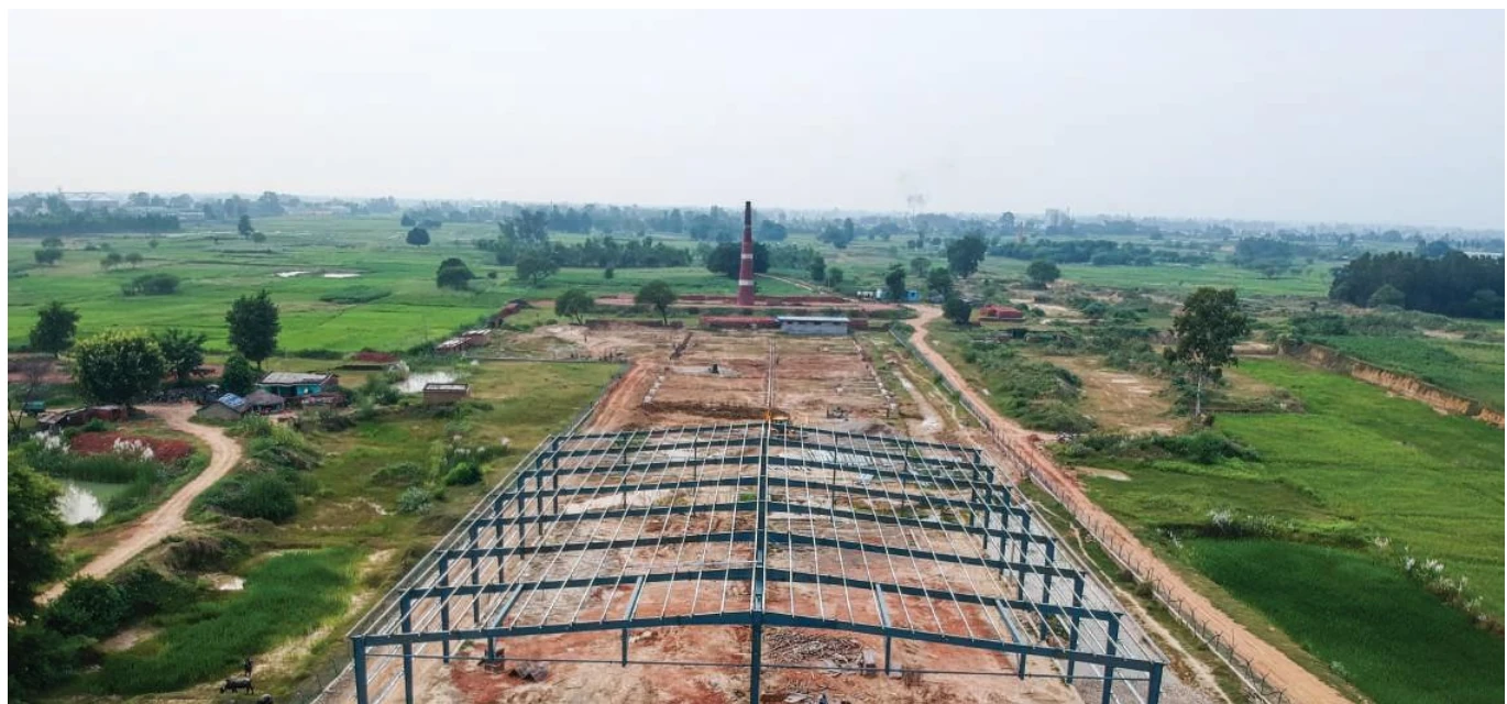 Aerial view of a steel-frame construction site.